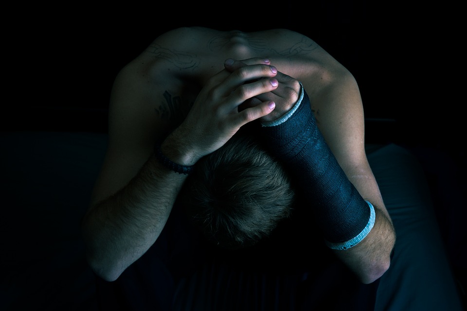 A man covering his head